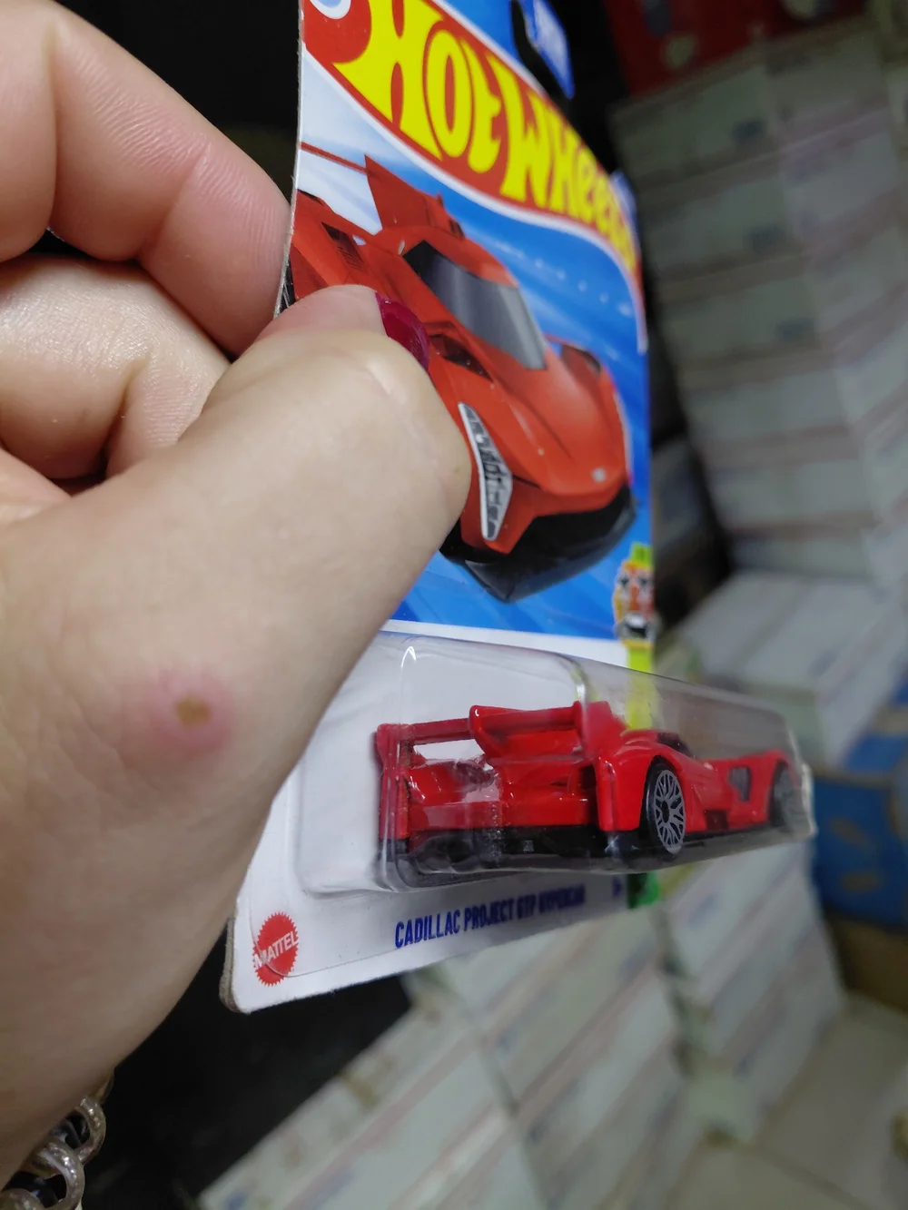Hot Wheels 2025 HW Exotics red Cadillac Project GTP Hypercar diecast vehicle on
